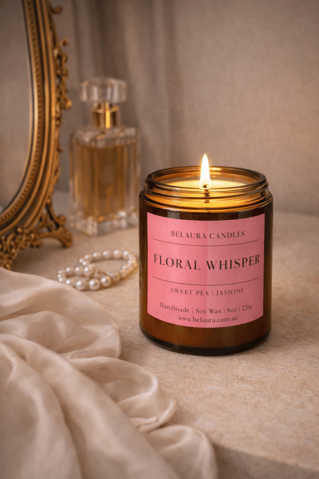 Hand-poured Floral Whisper soy candle with sweet pea and jasmine notes